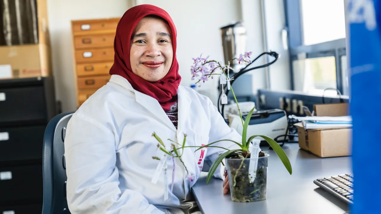Dewi with orchids