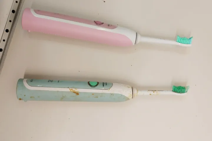A new and an old toothbrush