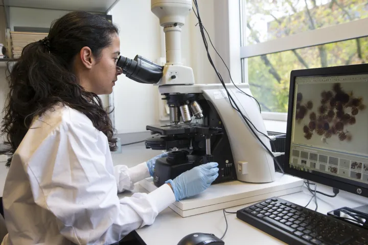 Woman with microscope