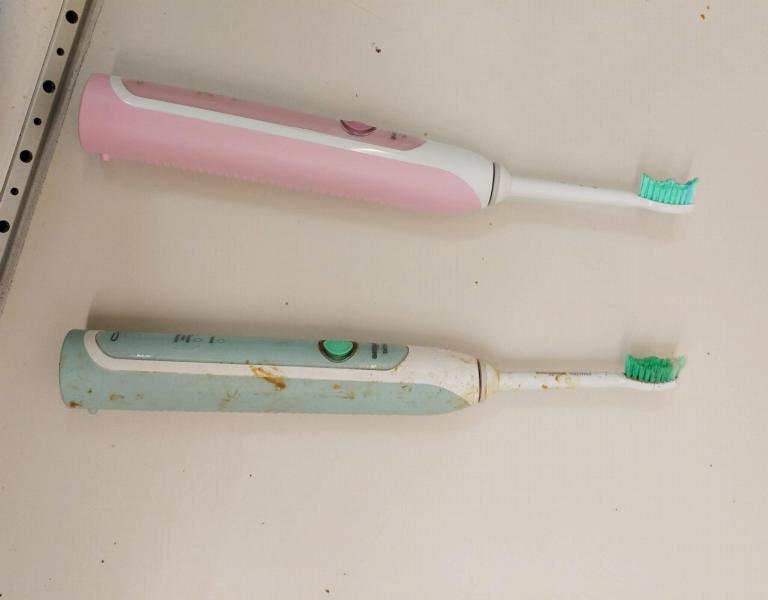 A new and an old toothbrush