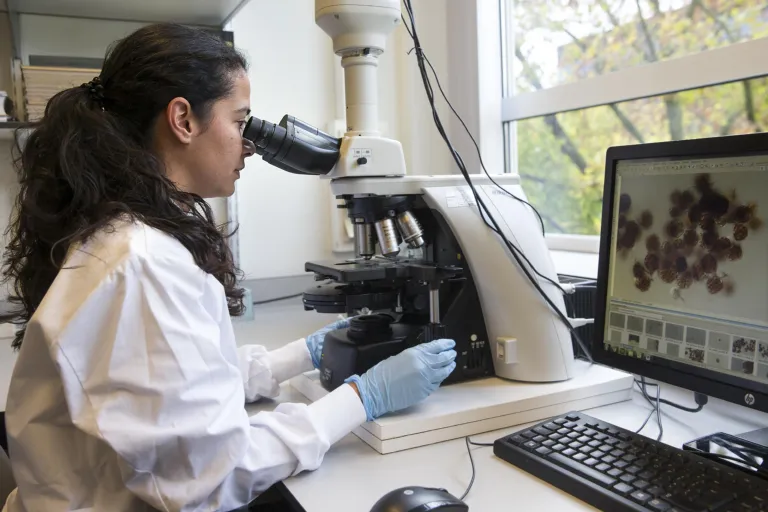 Woman with microscope